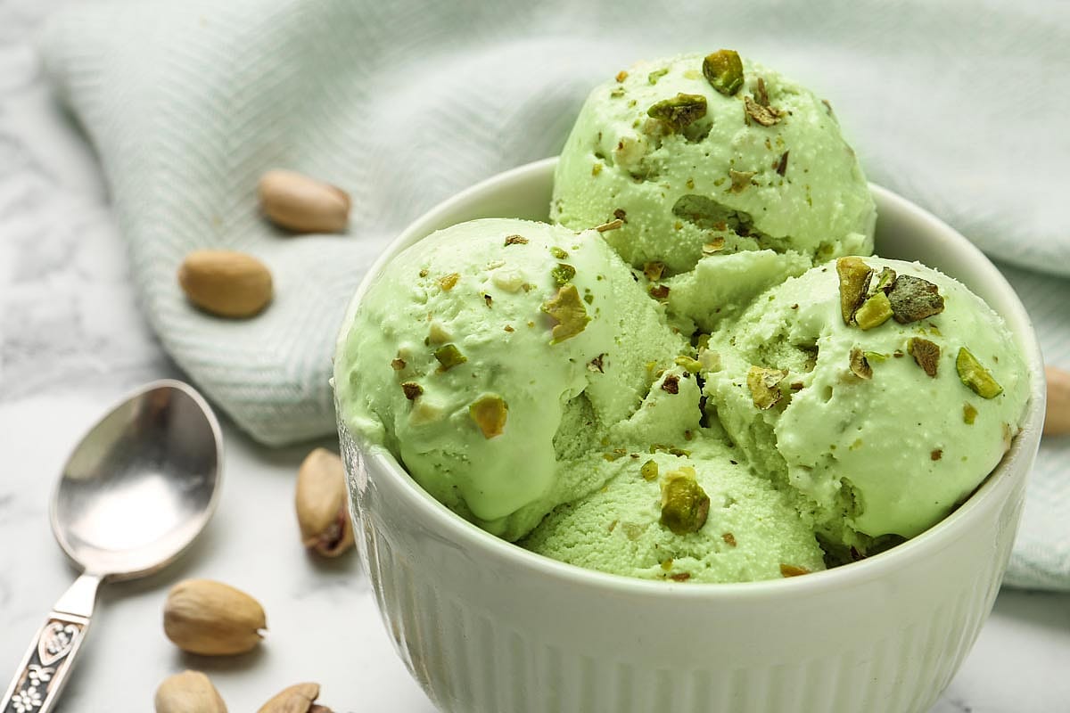A bowl of pistachio ice cream.
