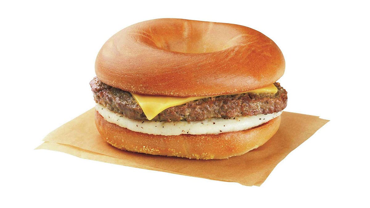 Close shot of a sausage, egg and cheese bagel from Dunkin' Donuts