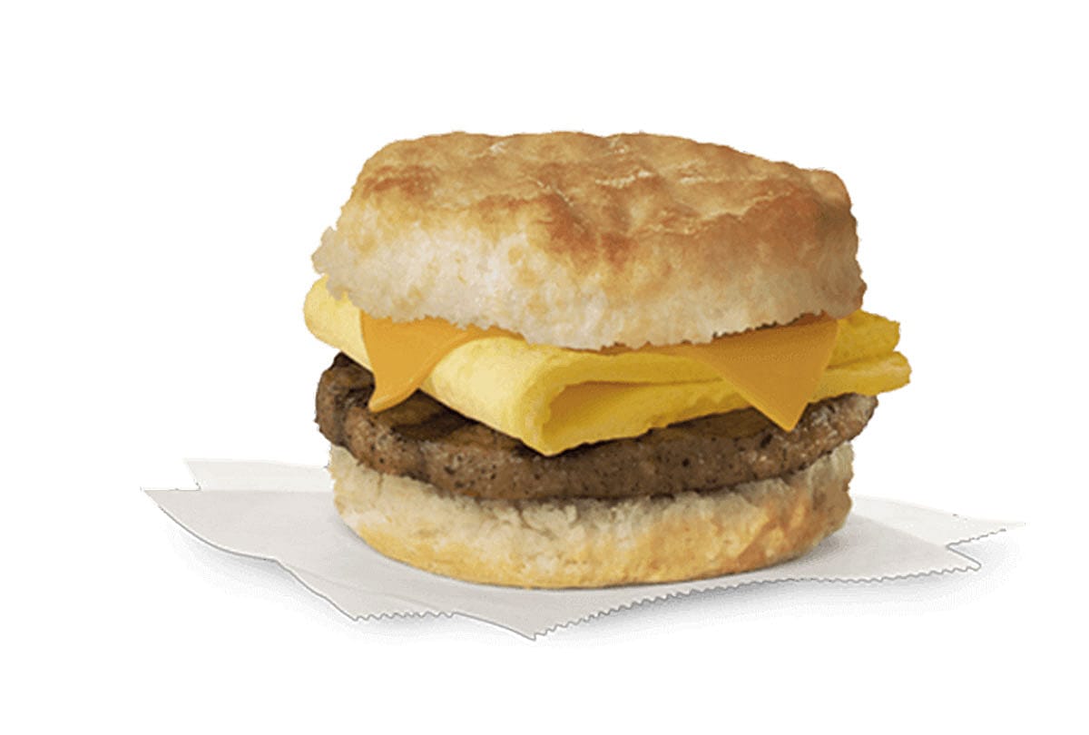 Close promo shot of a sausage, egg & cheese biscuit from Chick-Fil-A