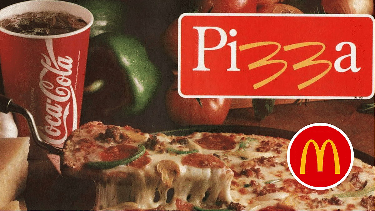 McDonald’s pizza topped with pepperoni, green peppers, mushrooms, and cheese, beside a Coca-Cola cup.