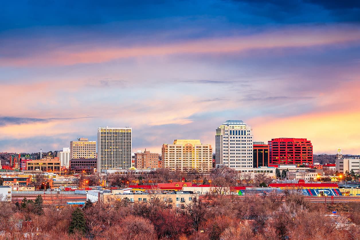 Colorado Springs, Colorado, USA downtown city skyline at dawn.