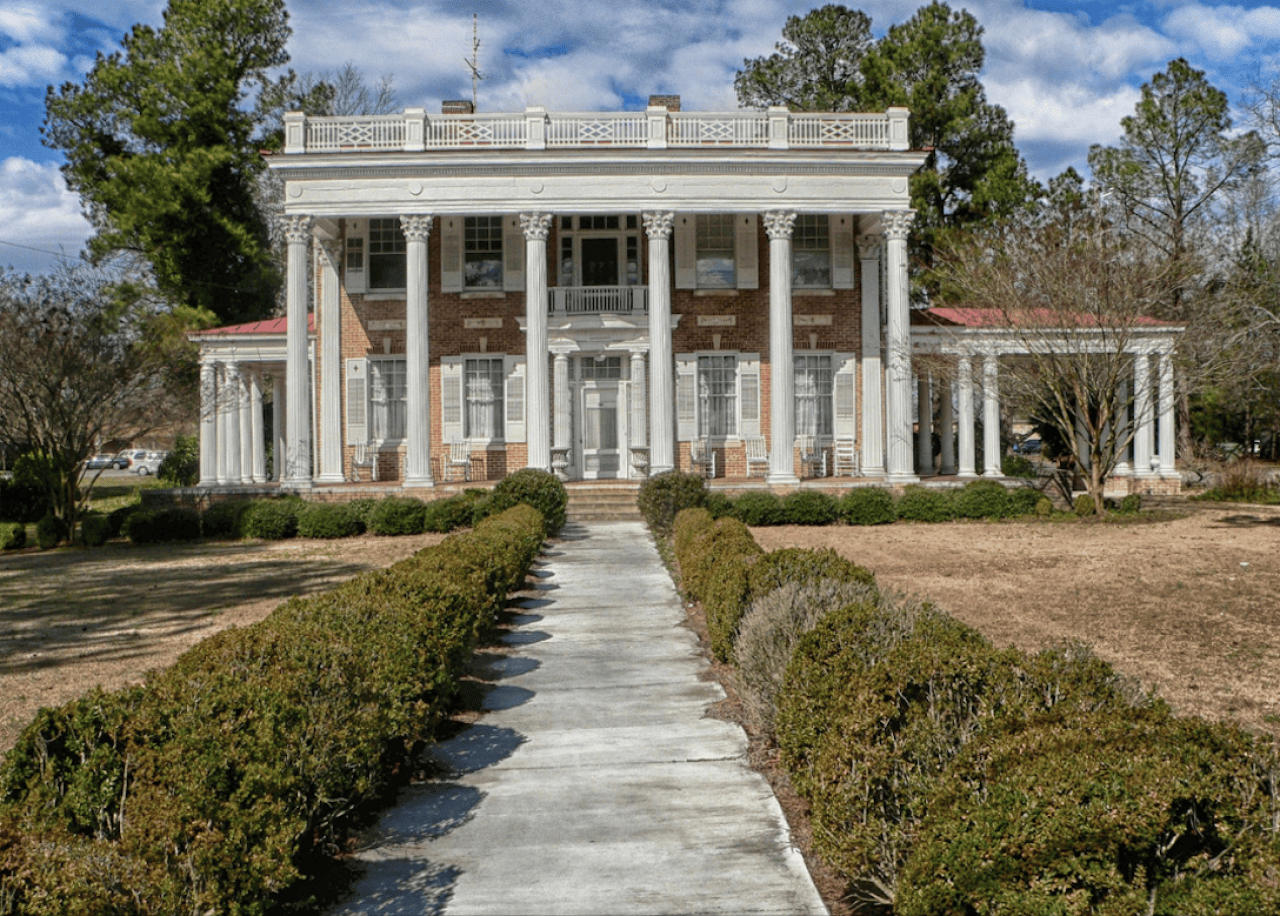 Home with ornate columns