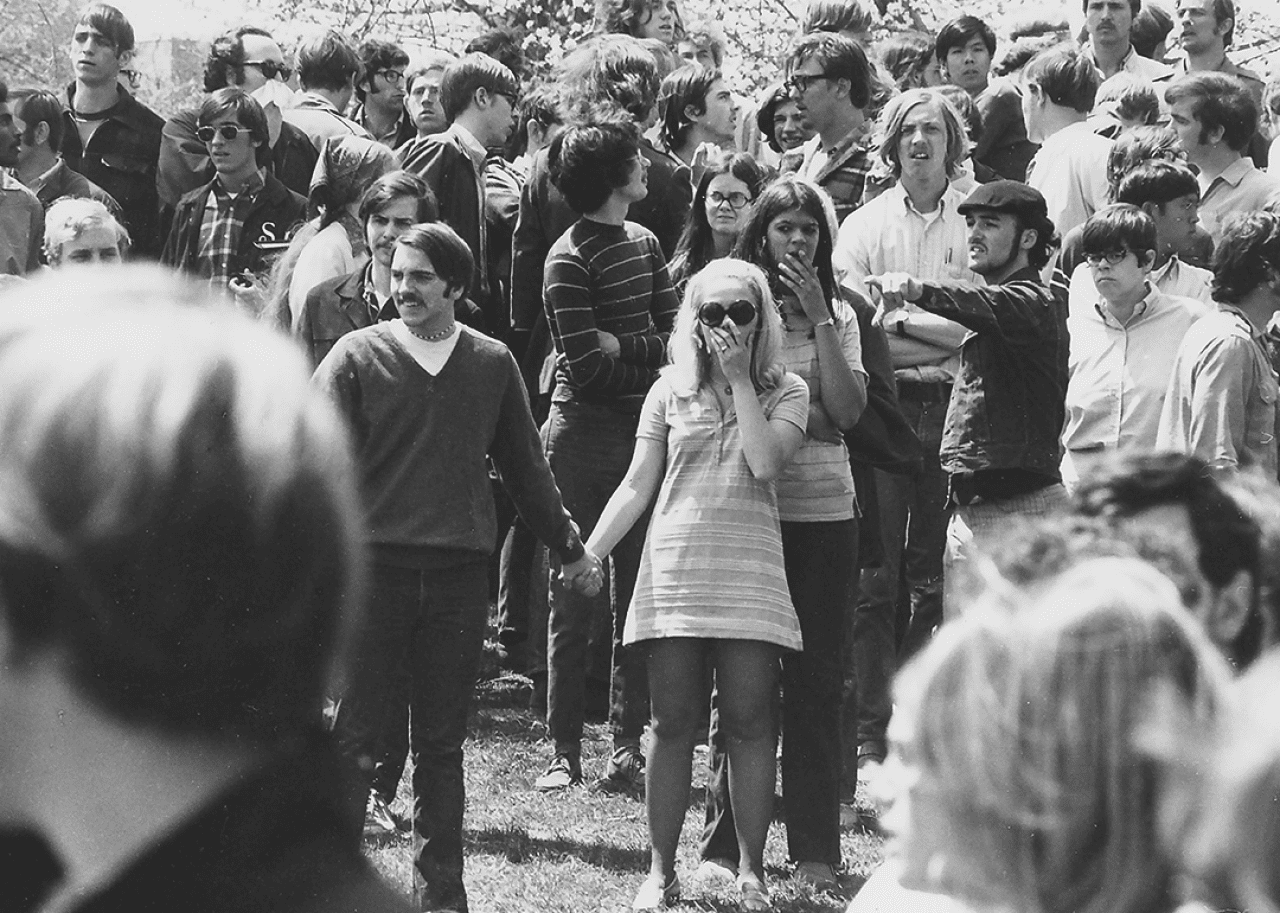 Students at Kent State University staring in the aftermath of the shooting.