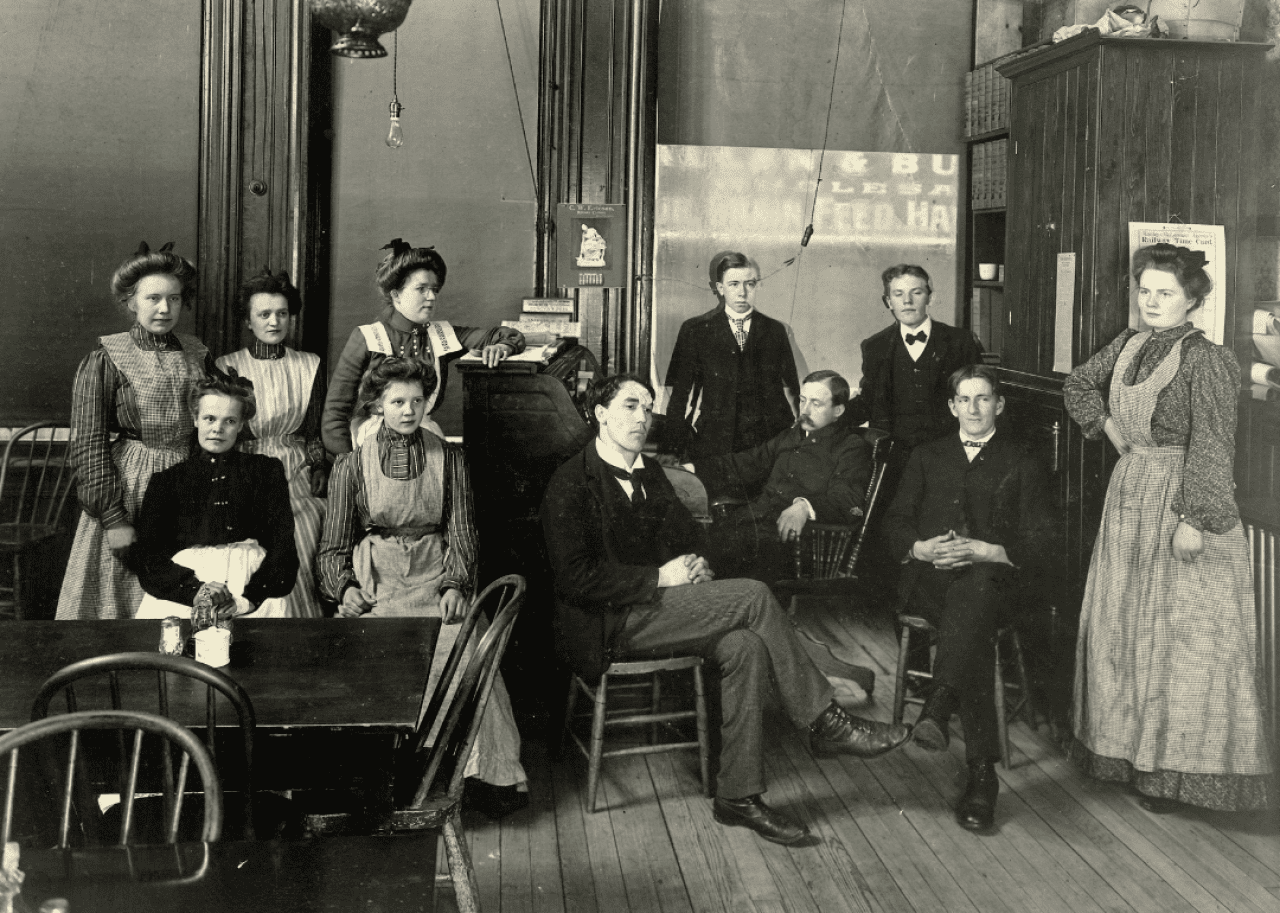 Waiters and waitresses pose for a group picture