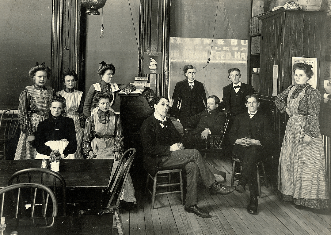 Waiters and waitresses pose for a group picture