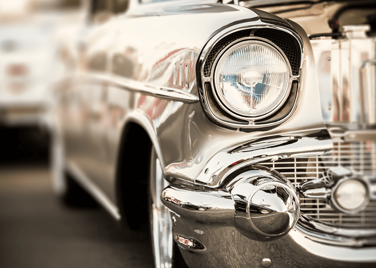 Classic car headlights close up.