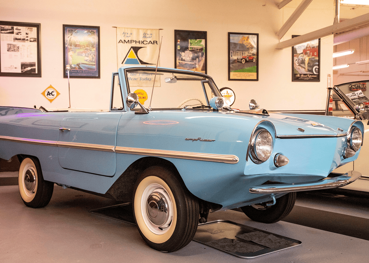 A light blue 1964 Amphicar 770 Convertible on display.