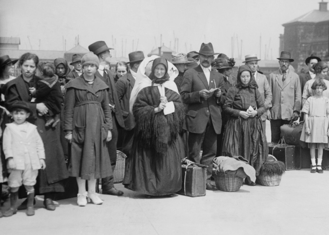 Immigrants arriving at Ellis Island.