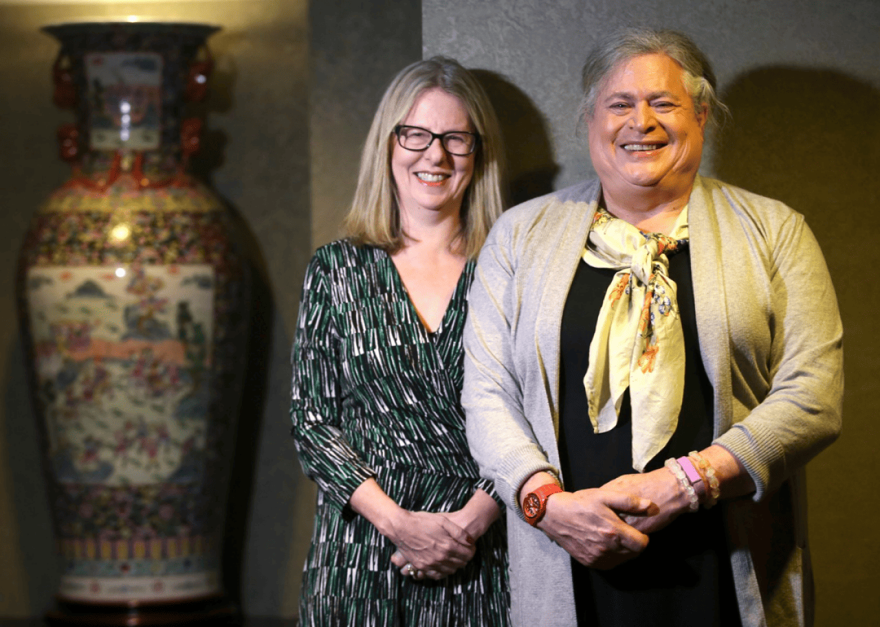Jennifer Pritzker Colonel Jennifer Pritzker and Brenda Cossman pose for pictures at Hyatt Hotel.