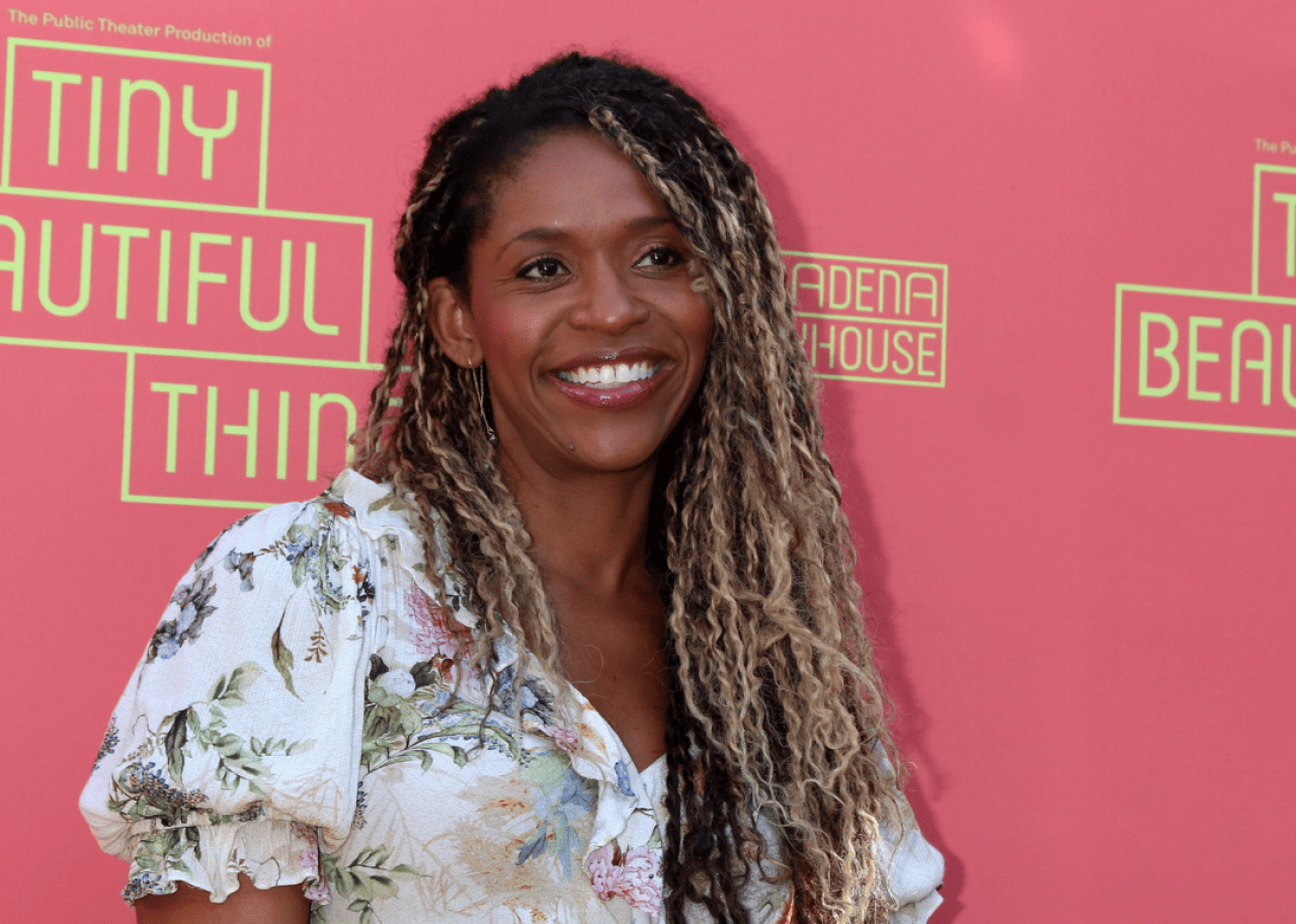 Merrin Dungey attends event.
