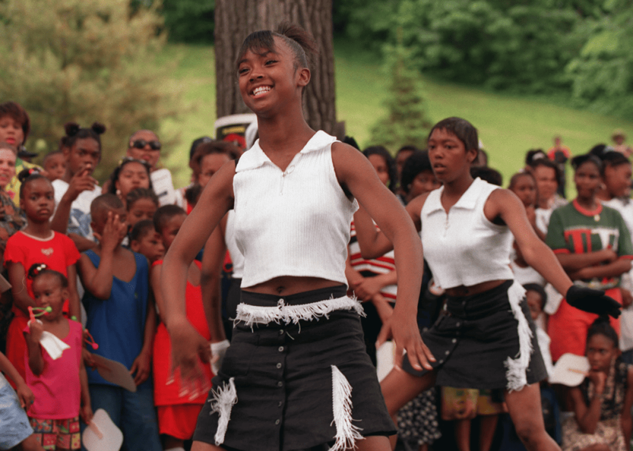 Members of a dance troupe perform in Theodore Wirth Park in Minneapolis.