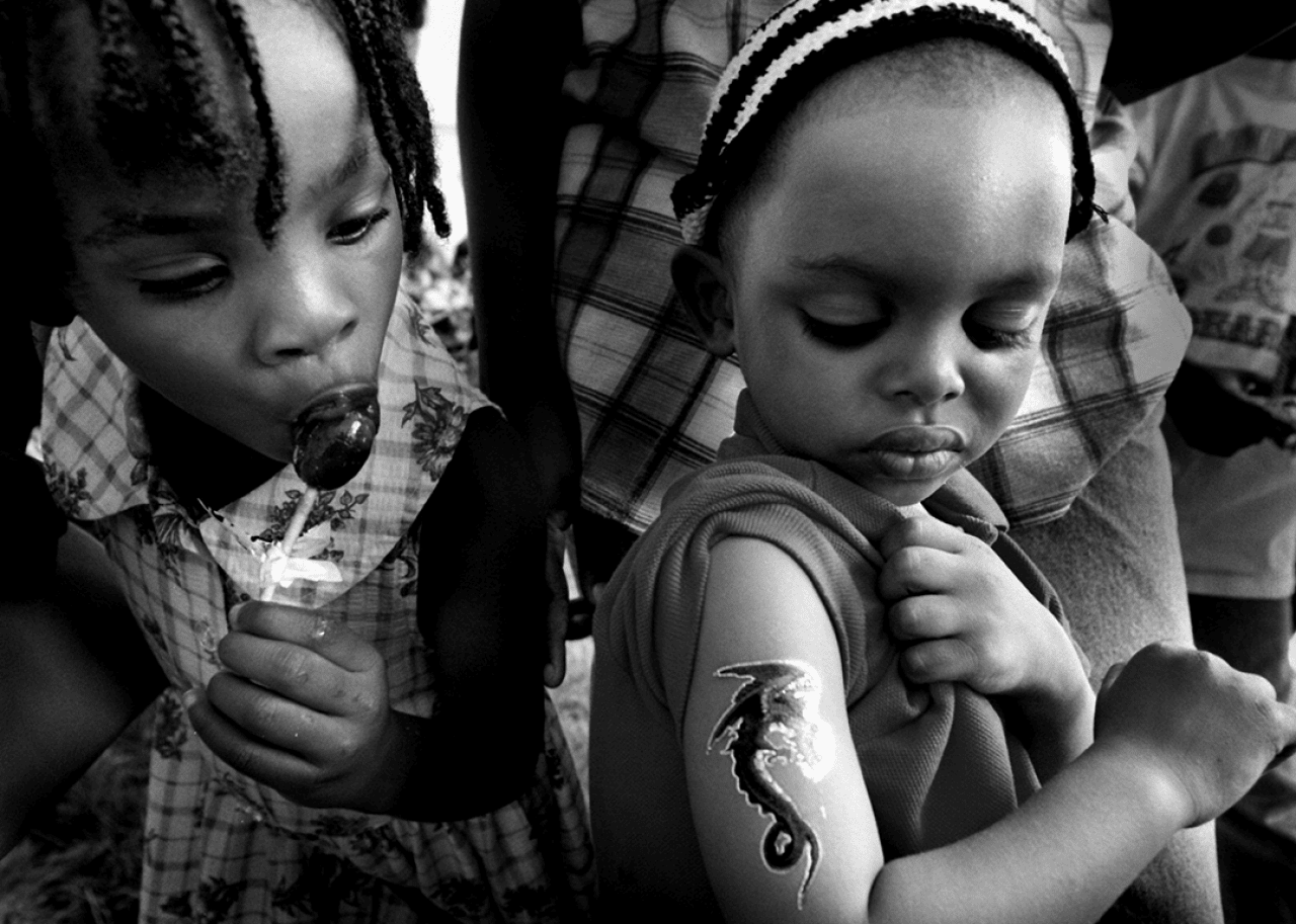 Two children enjoy Juneteenth celebrations.