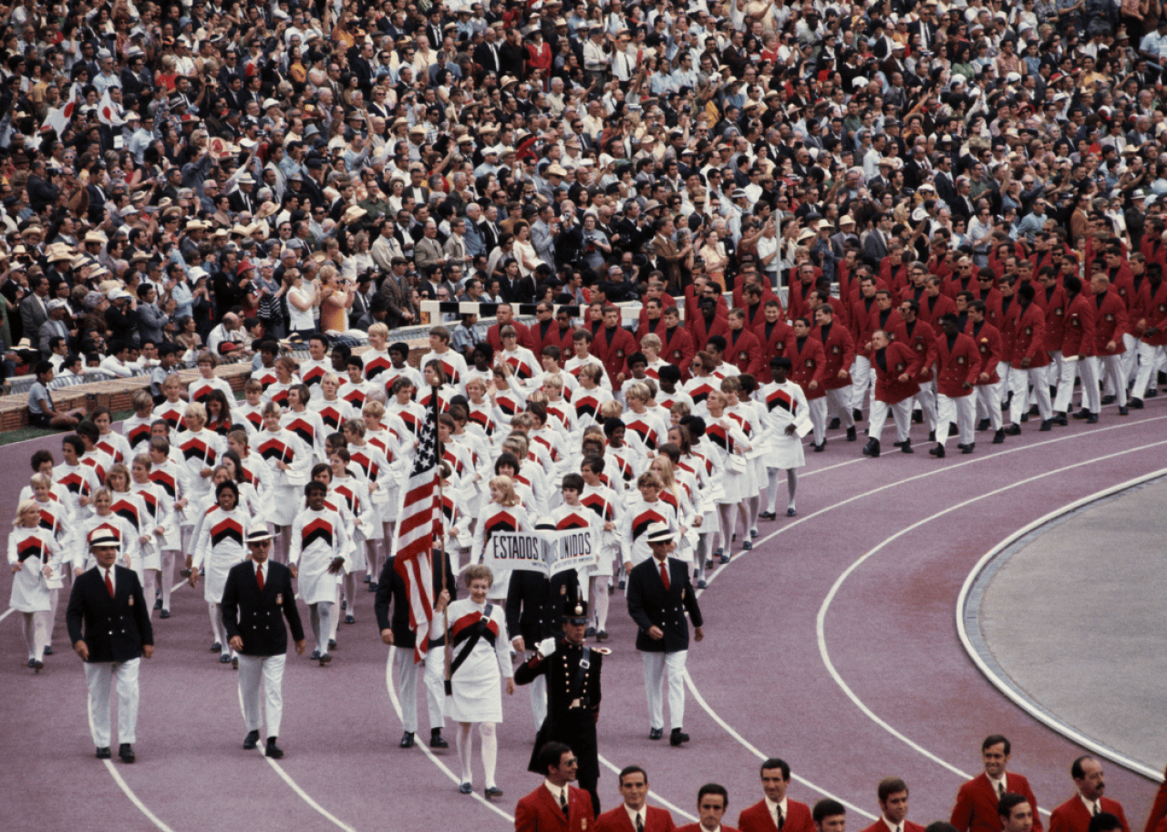The U.S.A. Olympic team marches into Olympic Stadium during opening ceremonies of the 1968 Olympics.
