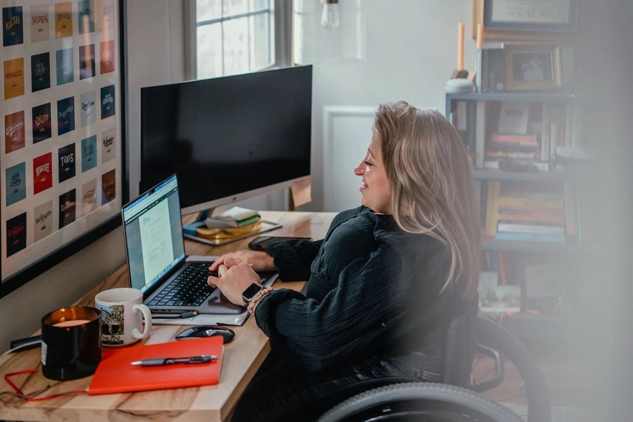 Emily Voorde works on the computer at home