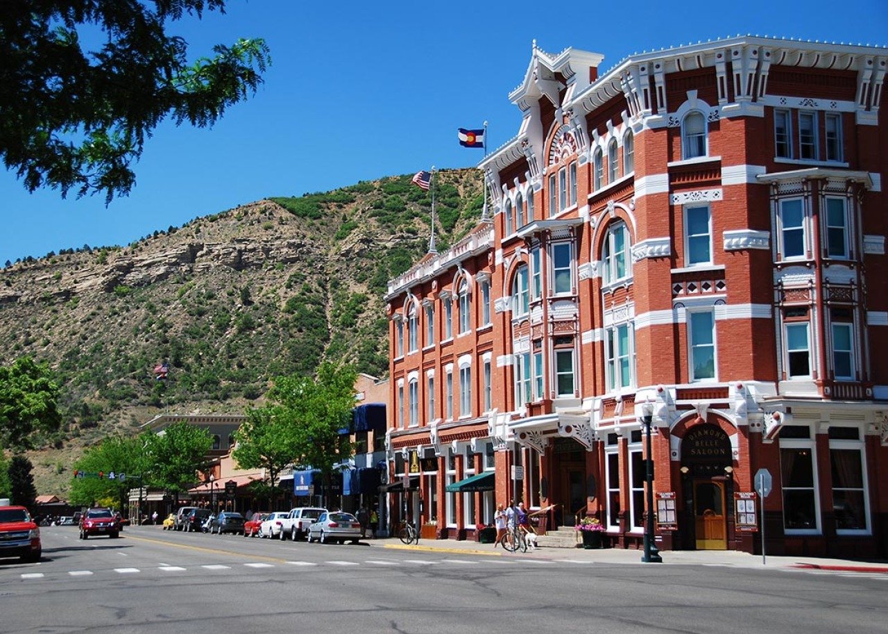 View of Main Avenue in Durango, CO featuring Strater hotel on the right.