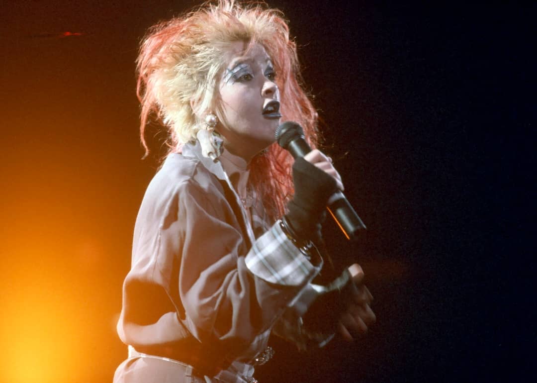 Cyndi Lauper performing on stage in 1980.