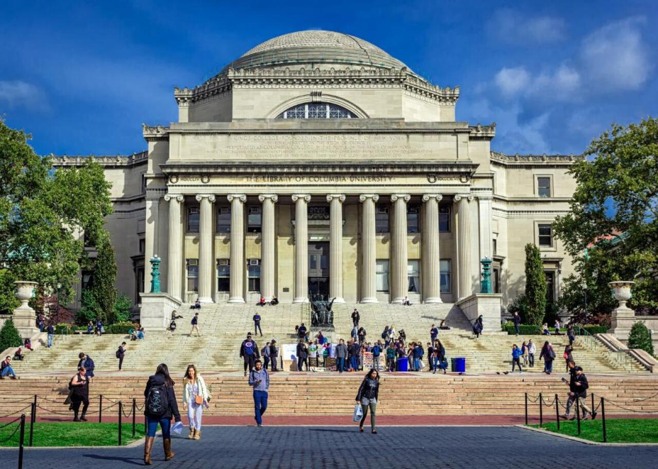 #1. Columbia University Columbia University Library buildings with columns and dome.