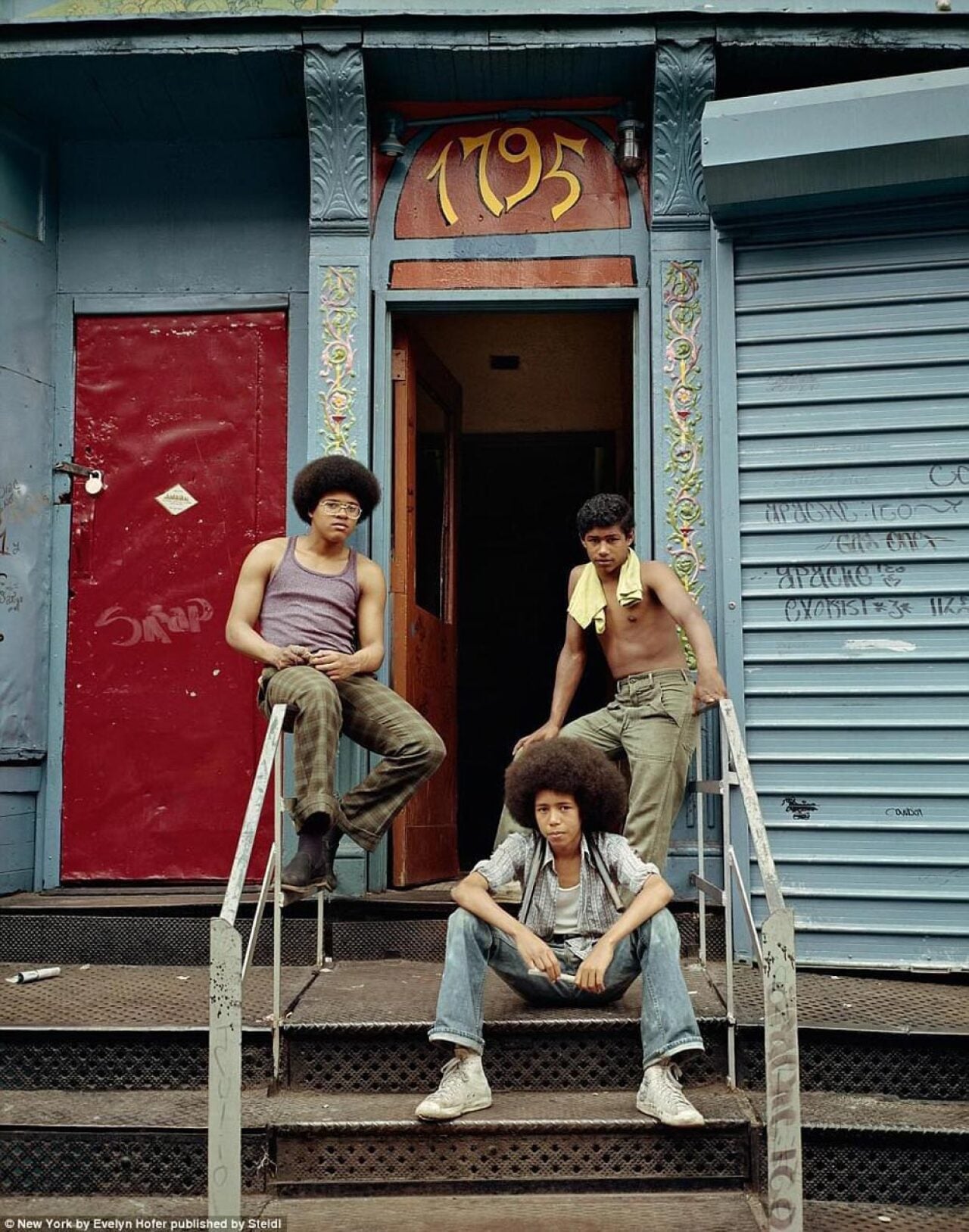 Three guys hanging out in Spanish Harlem in 1975
