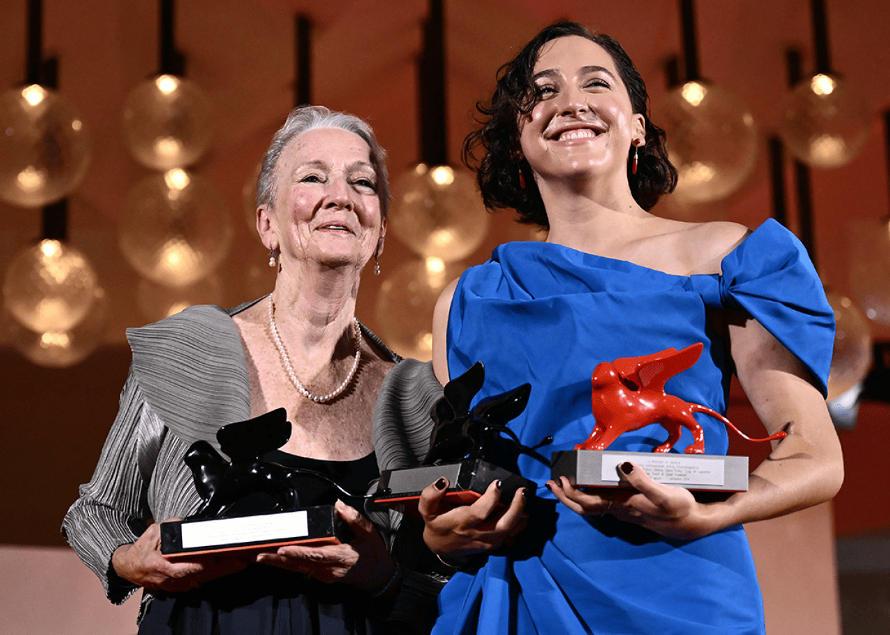 Kathleen Chalfant and Sarah Friedland pose with awards at the 81st Venice Film Festival.