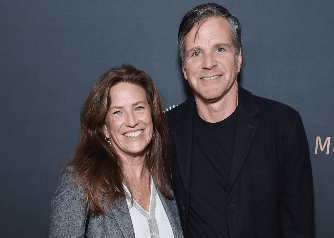 Tamara Hughes Gustavson and Eric Gustavson attend event.