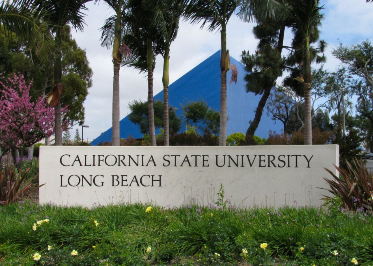 #45. California State University - Long Beach Entrance sign and view of Walter Pyramid sports arena.