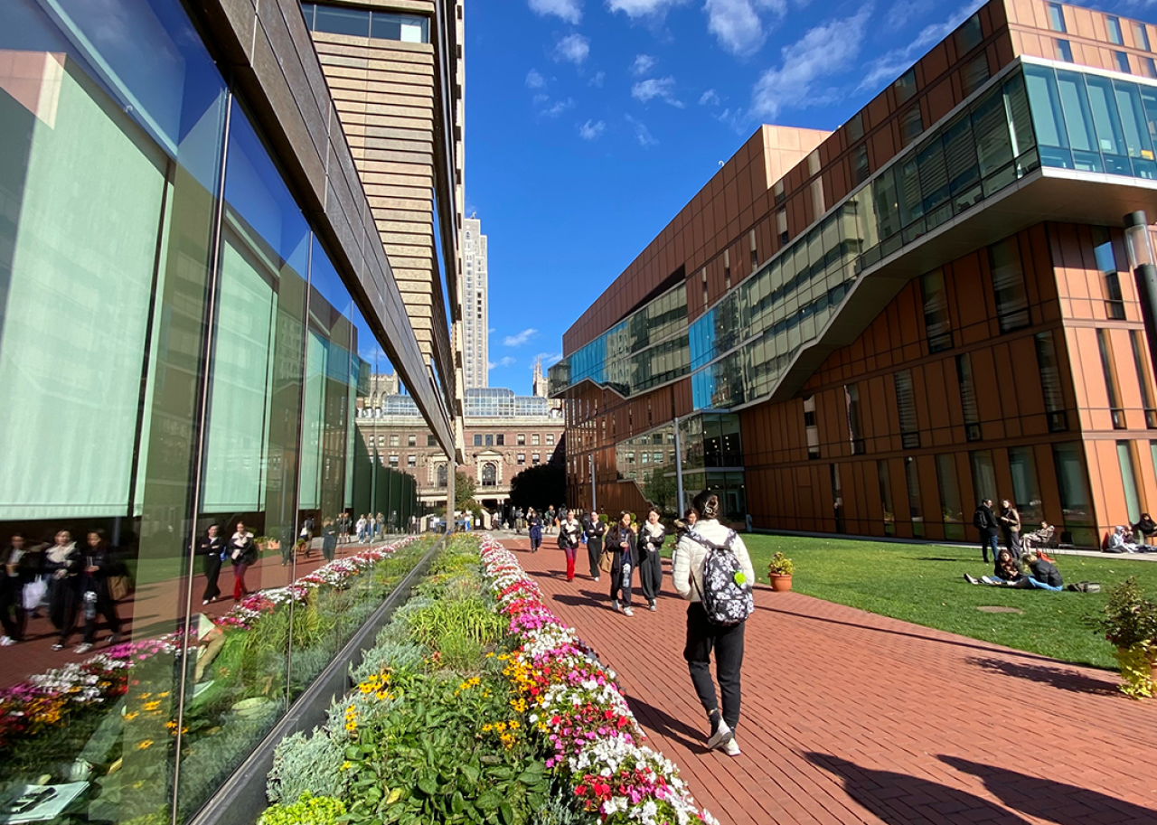 #18. Barnard College Students walking on a red brick path past the Milstein Center (left) and Diana Center (right) on the Barnard College campus.