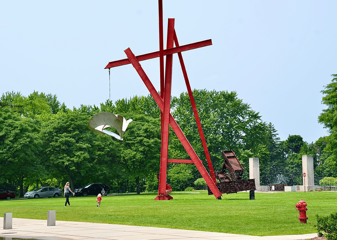Outdoor red modern metal sculpture at Cranbrook Art Museum.