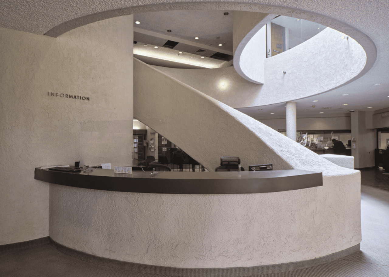 9 Black modernist architects and the landmarks they designed An interior view of a spiral staircase inside Carson City Hall in California.