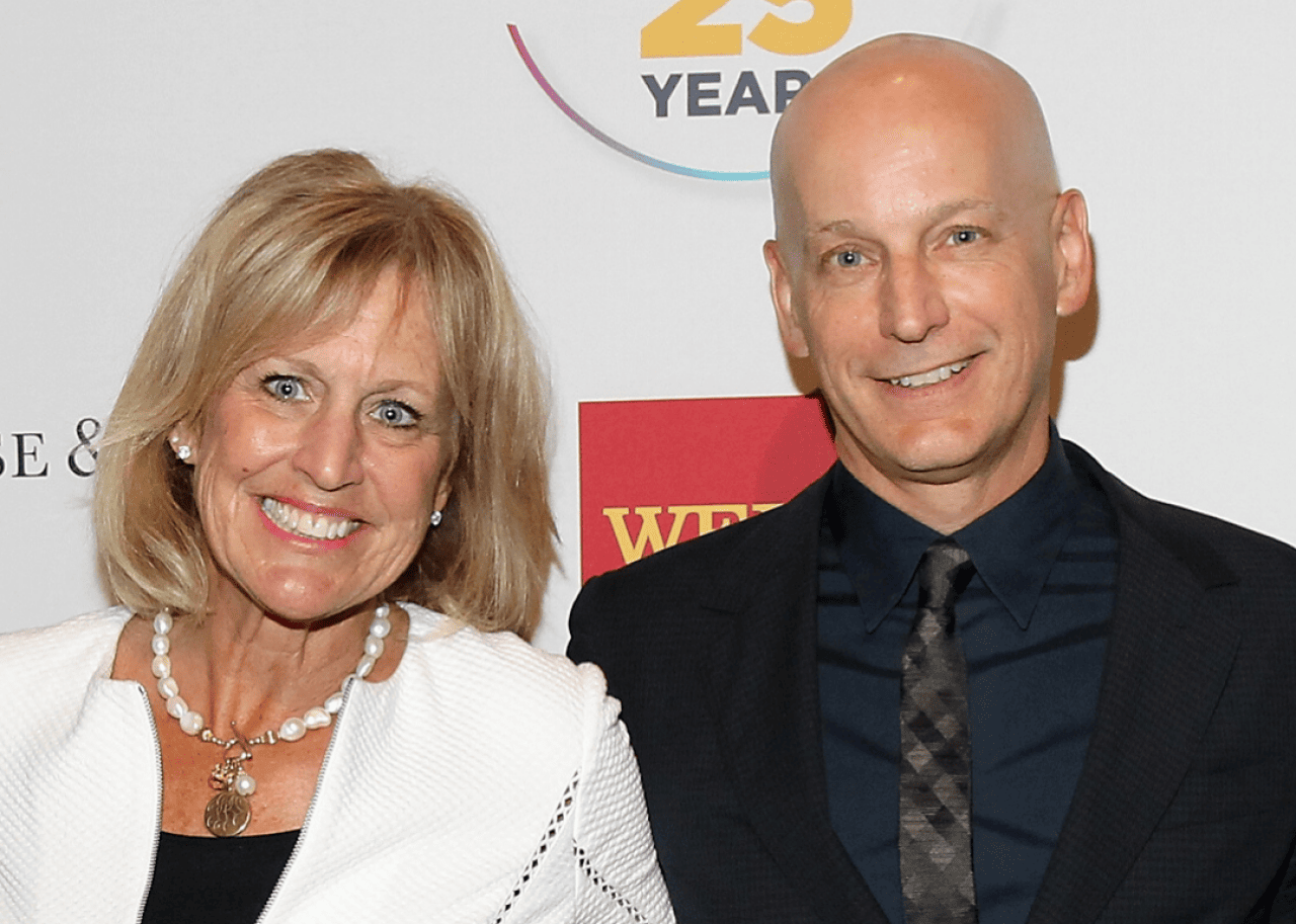 Ronda Stryker and Jon Stryker attend event.
