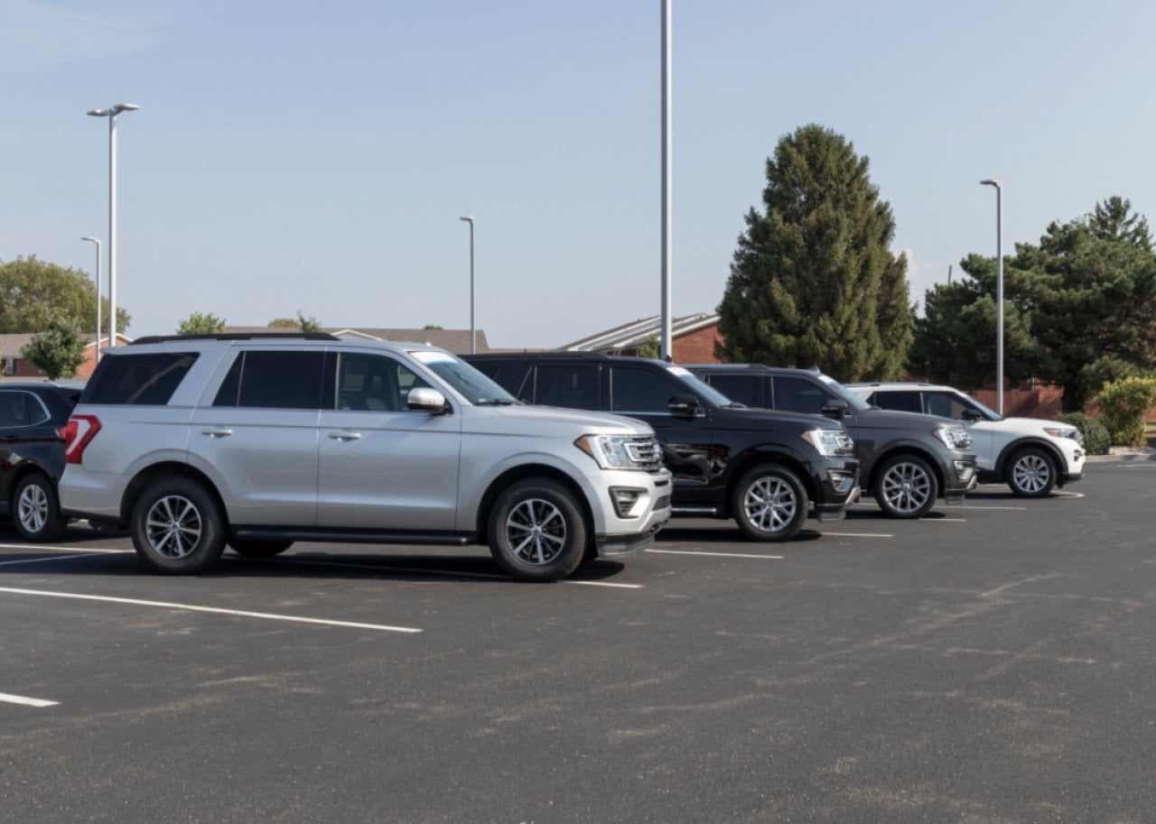 A silver Ford Expedition in a parking lot.