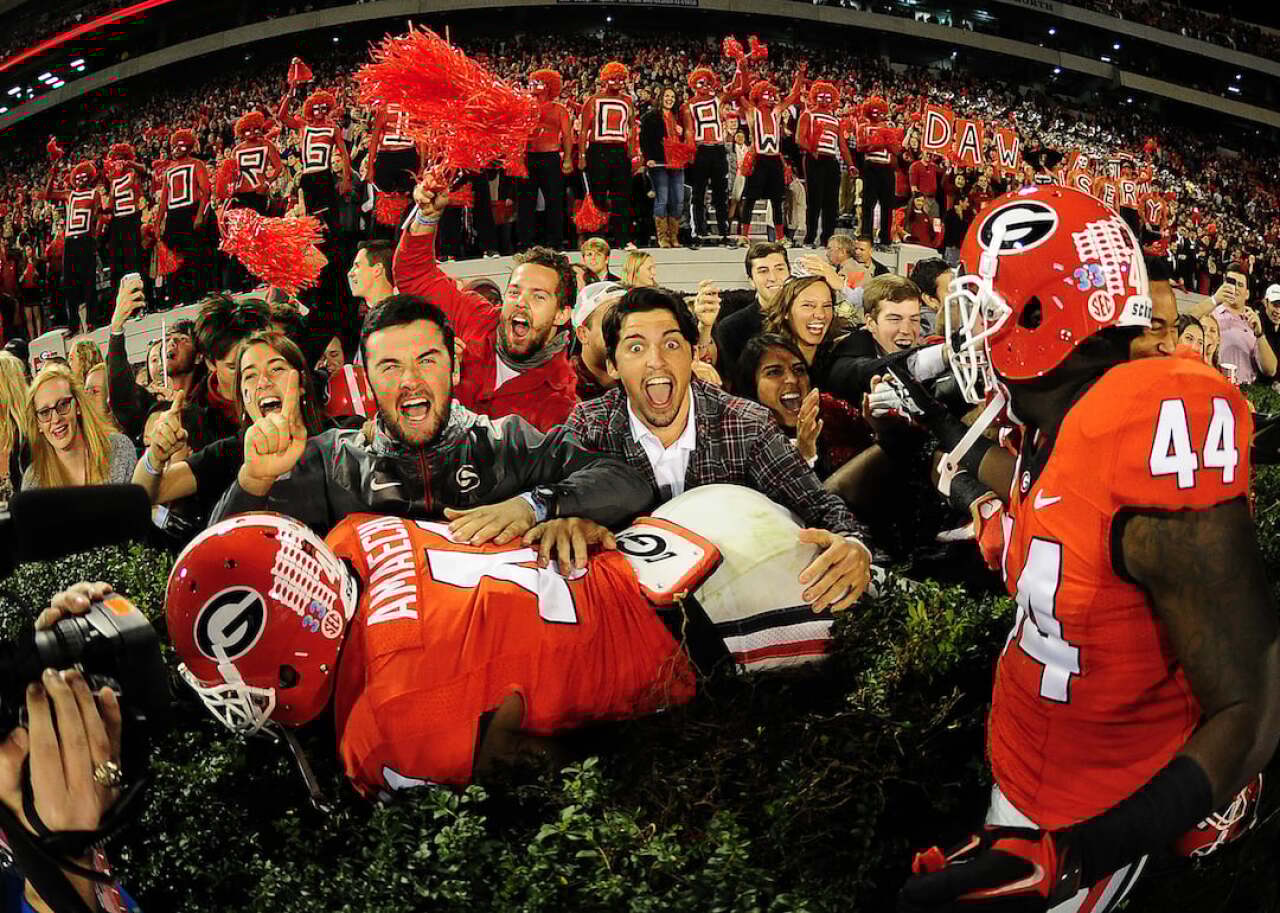 The top 50 party schools in America Chuks Amaechi #41 of the Georgia Bulldogs celebrates with fans after the game against the Missouri Tigers on October 17, 2015 in Atlanta, Georgia.
