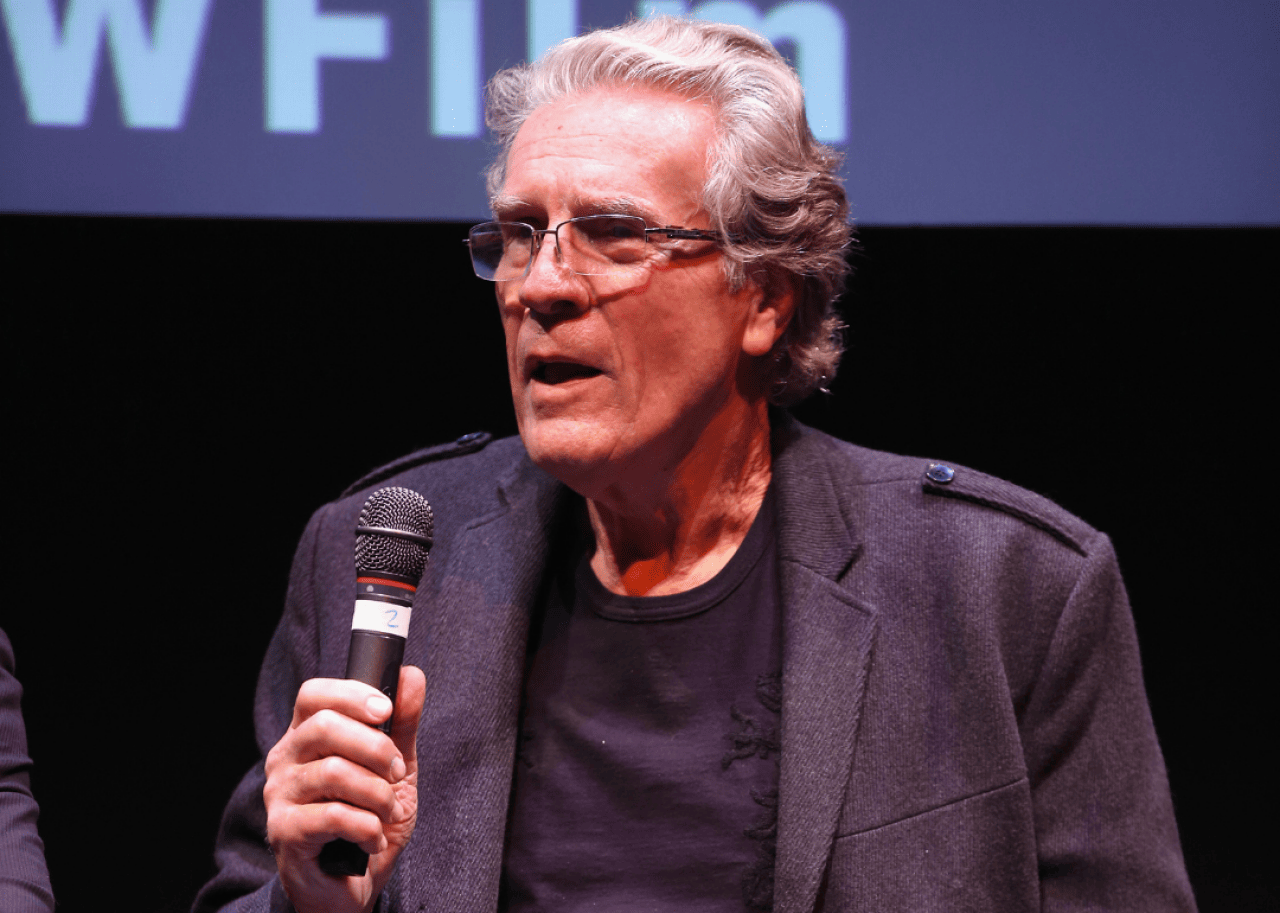 Former professional football player David Kopay speaking onstage at the premiere of 