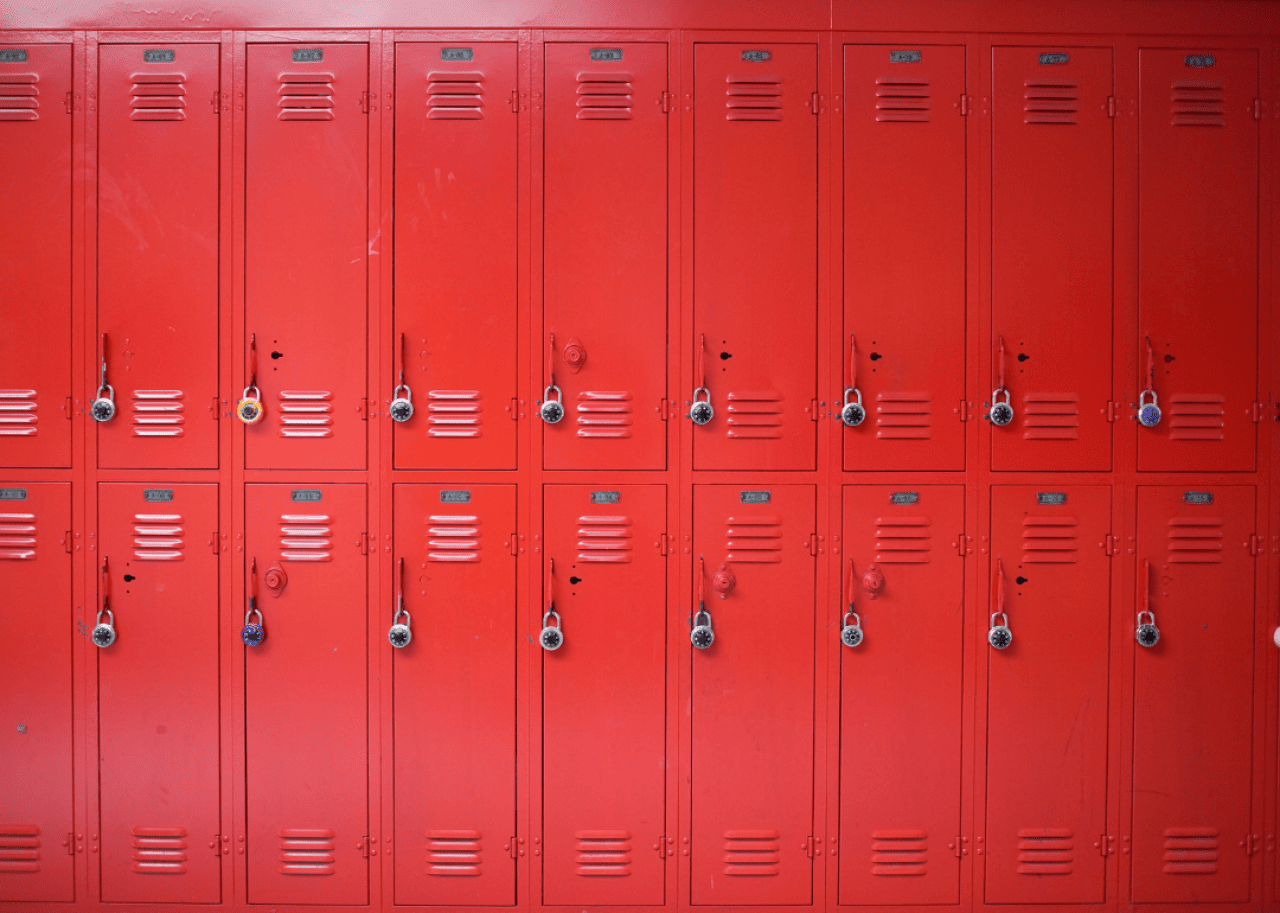 Two rows of red lockers.