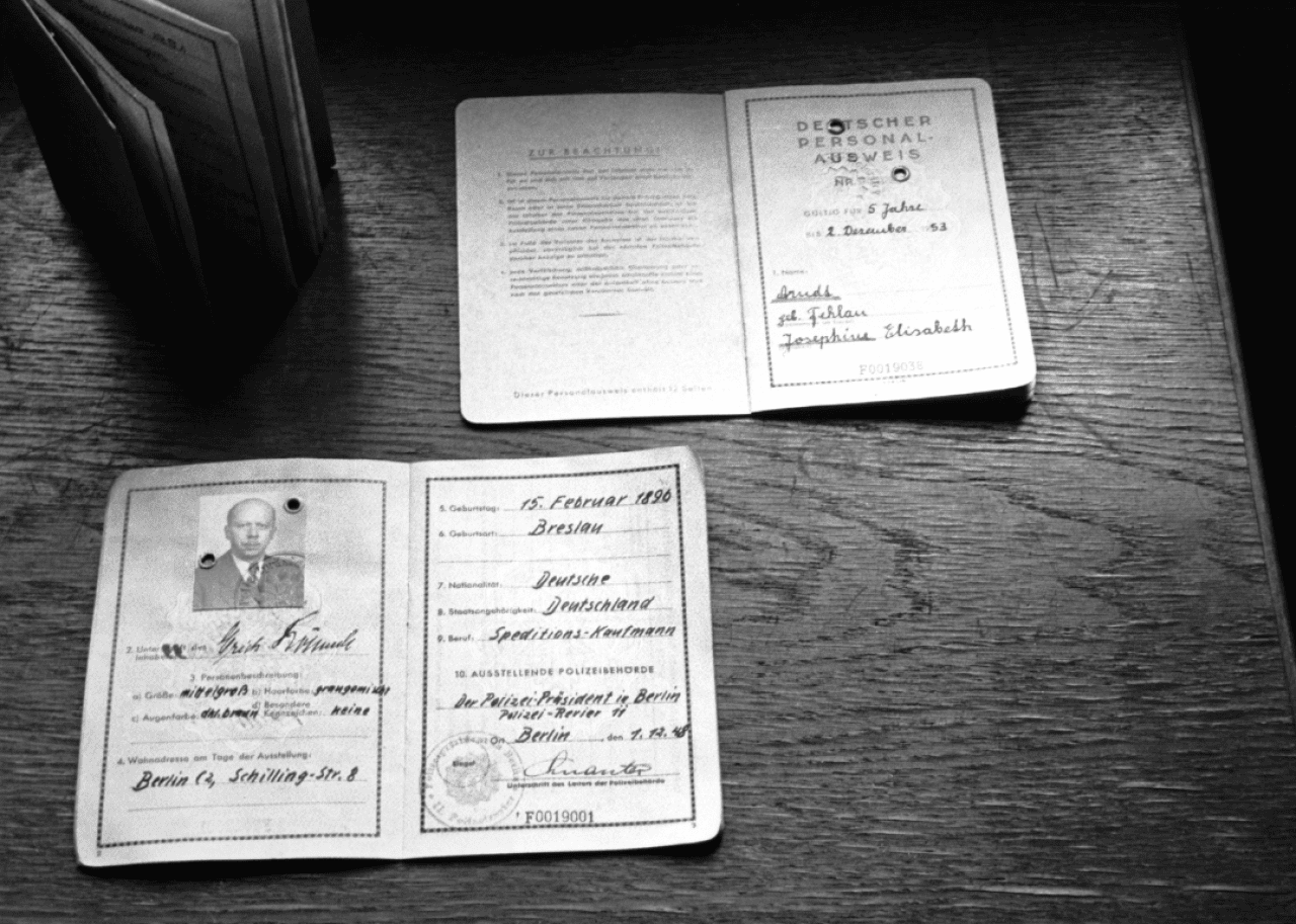 Three identity cards displayed in Berlin in 1948.