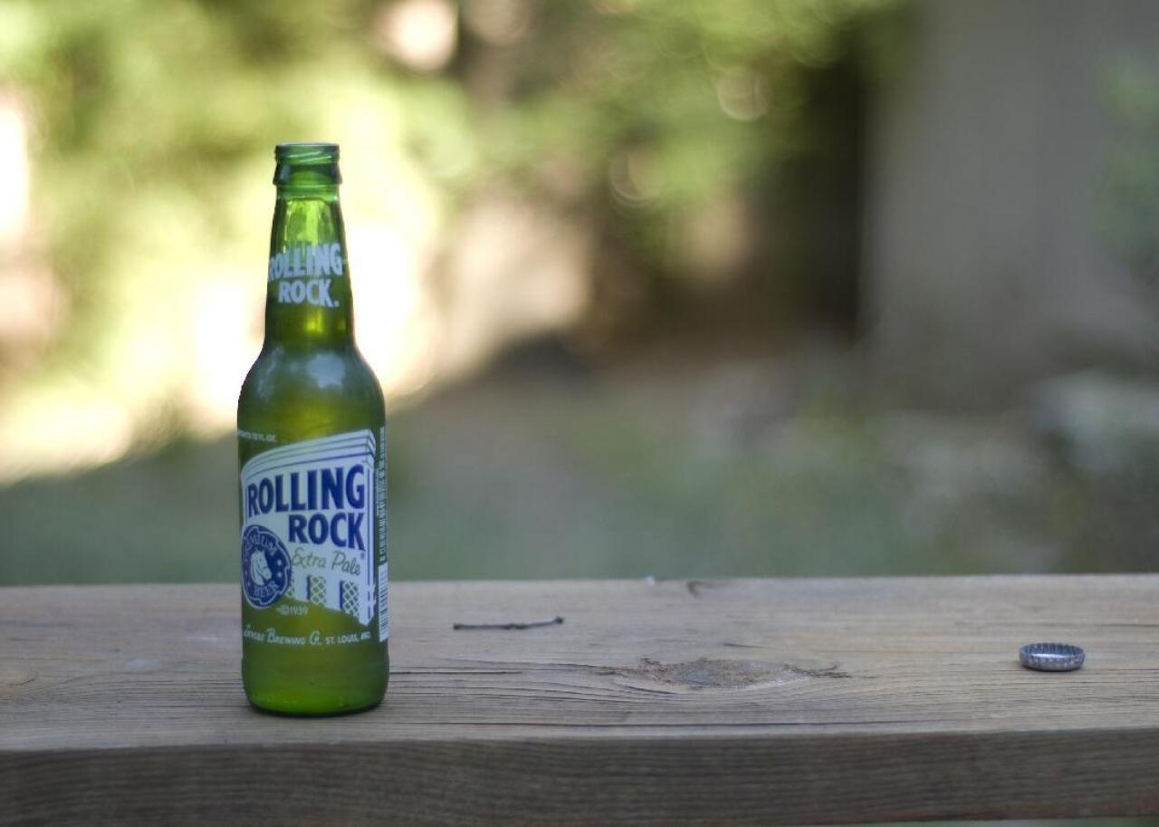 An ad for Rolling Rock Beer.