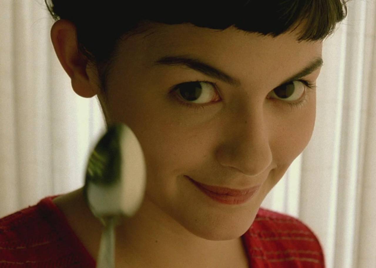 A close-up of a woman smiling.