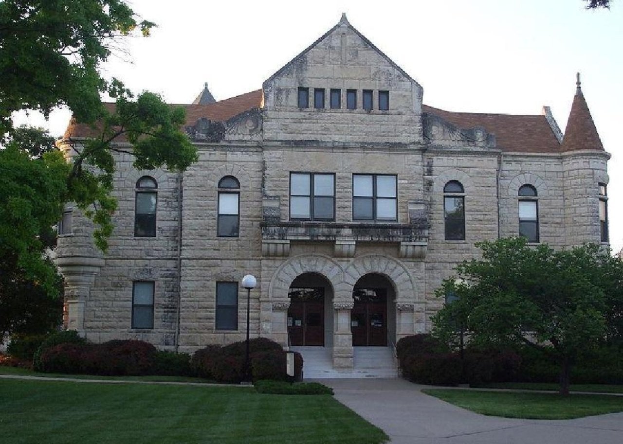 A historic white stone building.