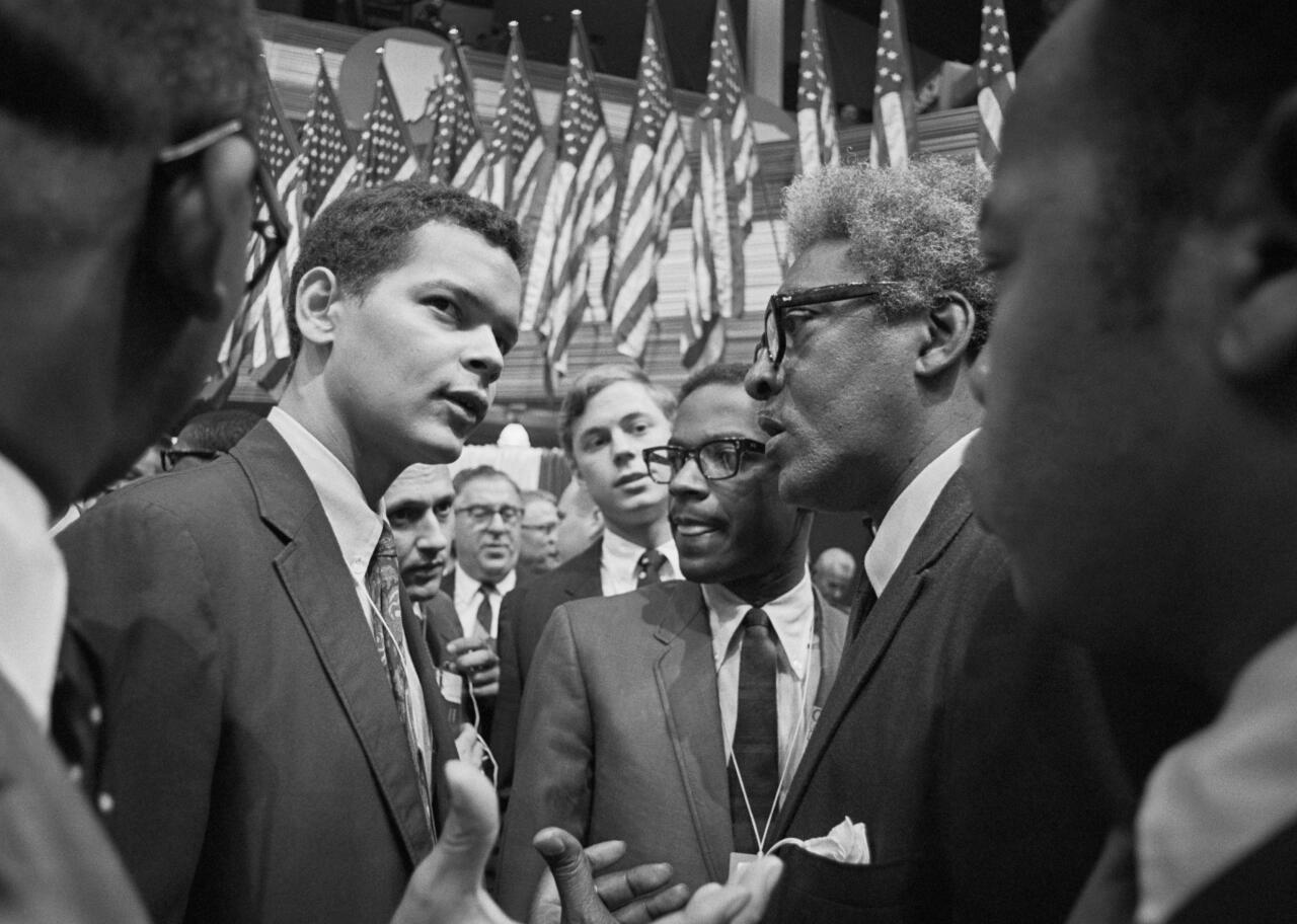 rebel leader Julian Bond stands at left with other delegates in Chicago.