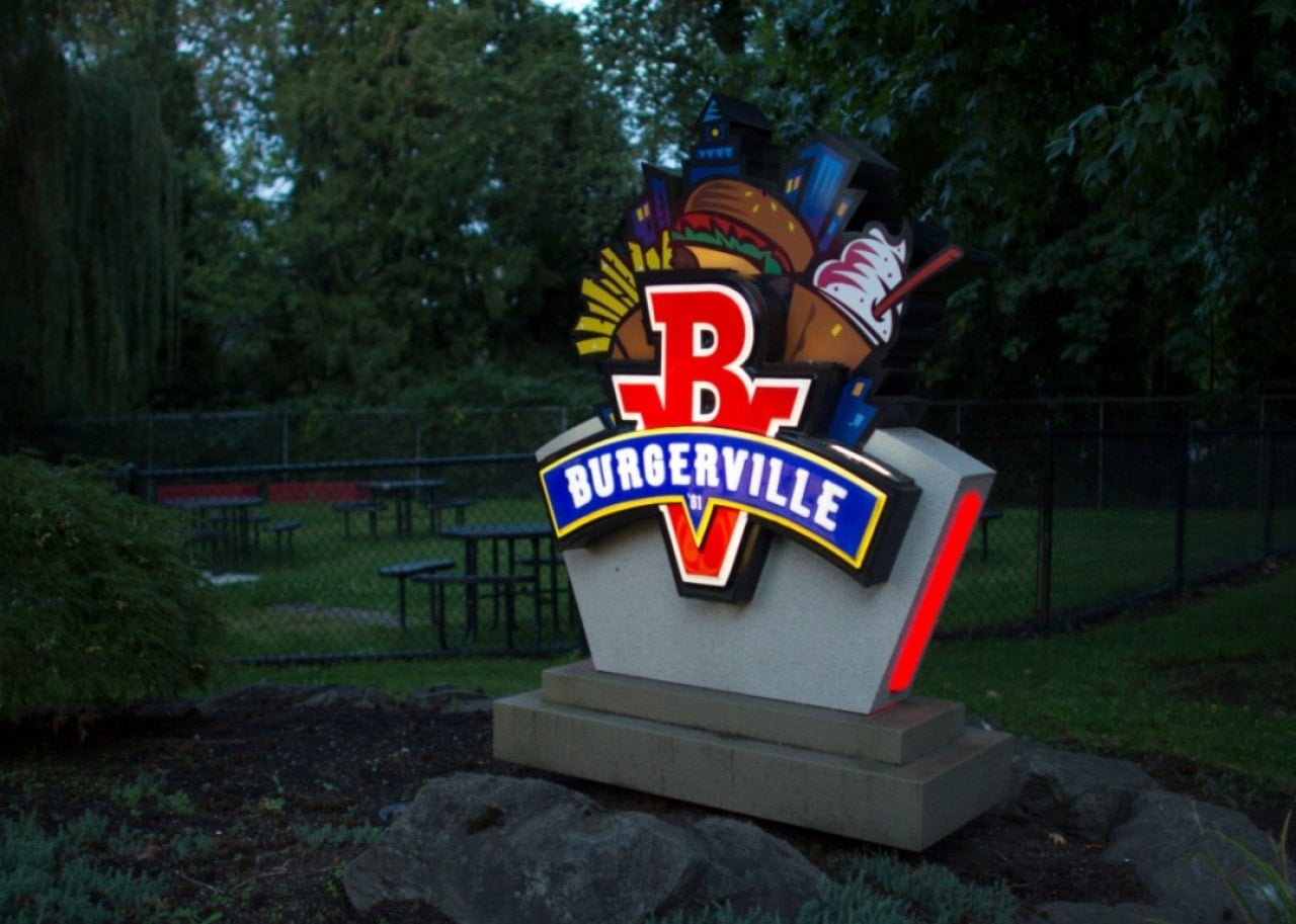 A colorful neon Burgerville sign.