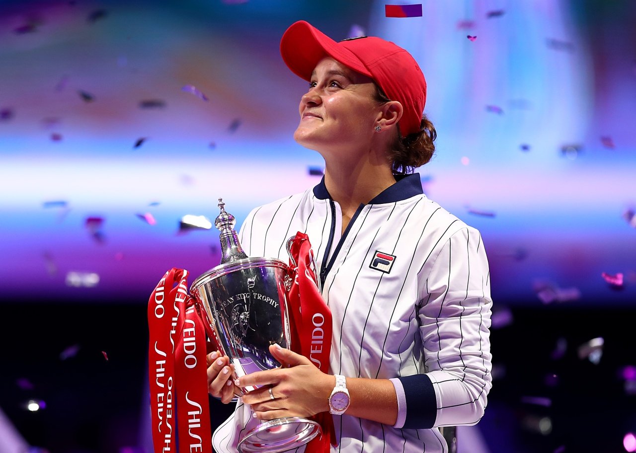 Ashleigh Barty of Australia celebrates with the Billie Jean King trophy