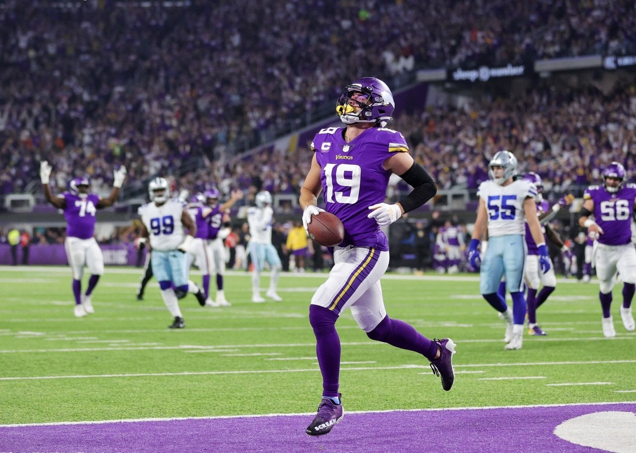 Adam Thielen of the Minnesota Vikings celebrates after a 20-yard touchdown pass.