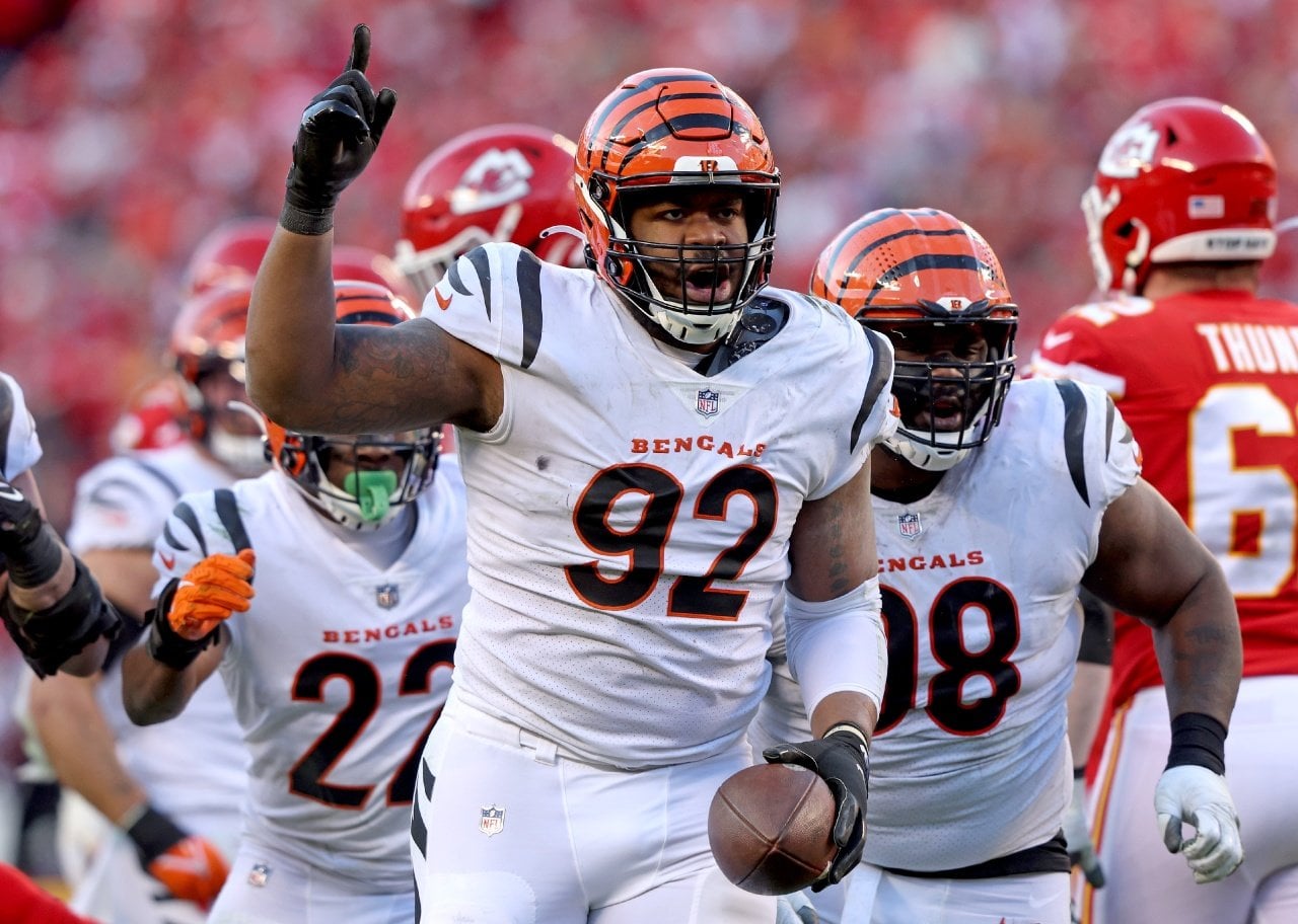 Defensive end B.J. Hill of the Cincinnati Bengals celebrates after intercepting a Kansas City Chiefs pass.