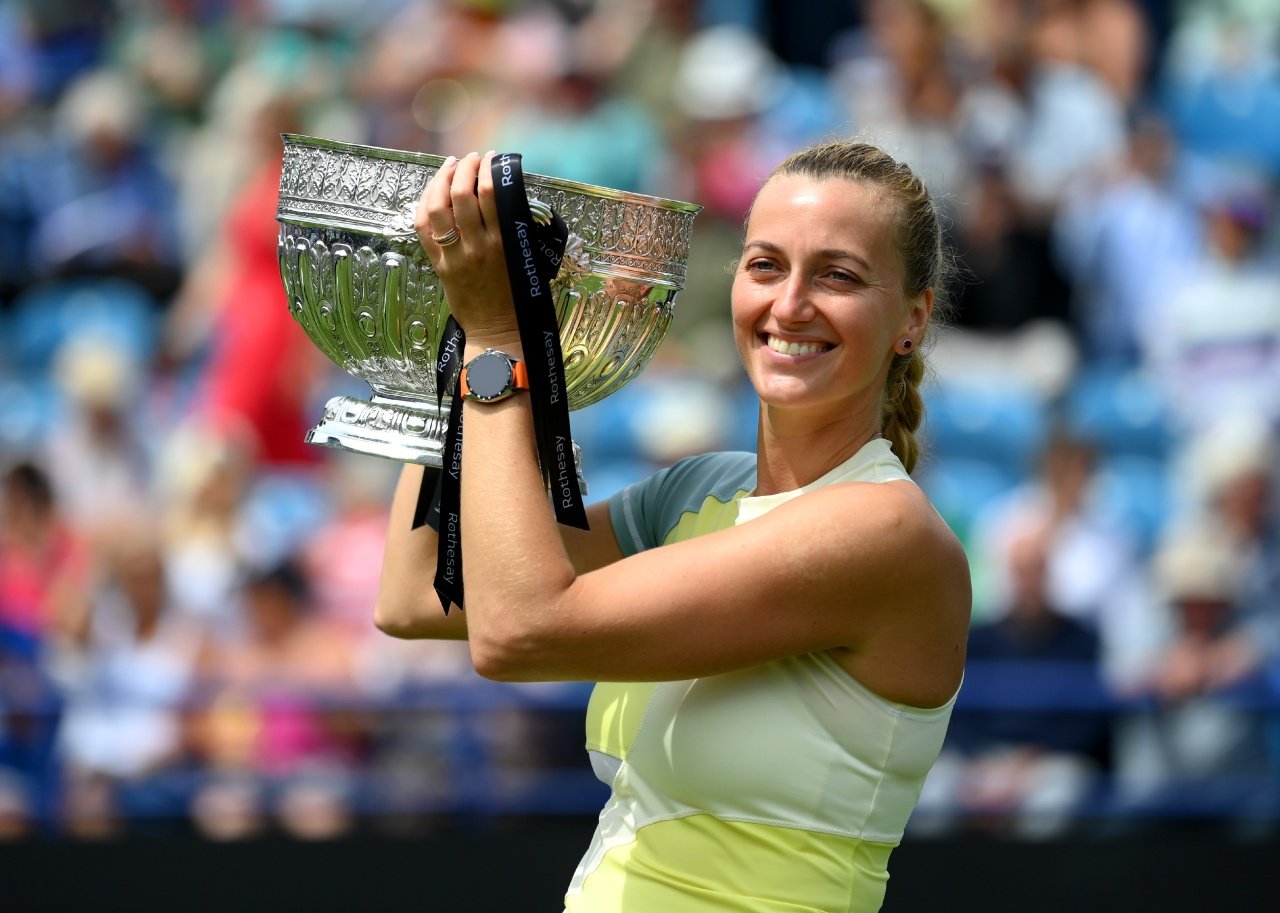 Petra Kvitova of Czech Republic celebrates with a trophy