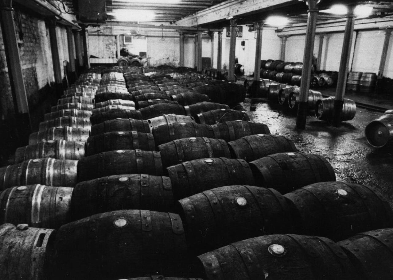 Beer kegs are stored at a brewery.