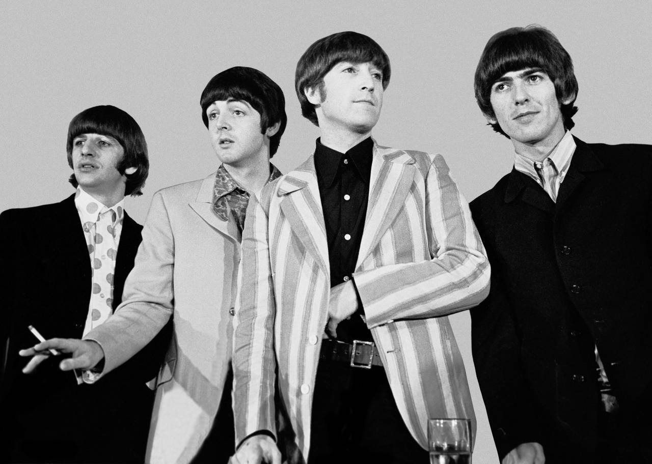 The Beatles during a press conference.