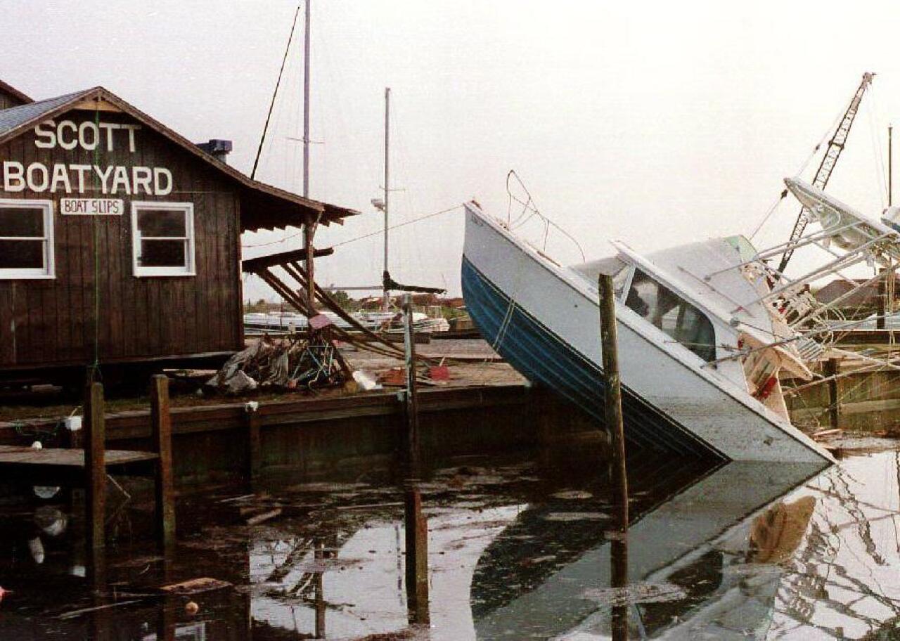 A small boat crashed onto the dock of the Scott Boat Yard.