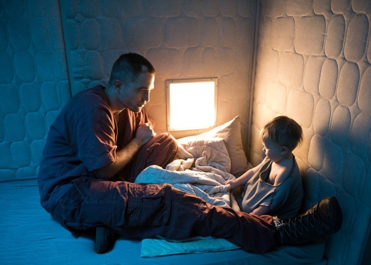 Robert Pattinson with a baby.