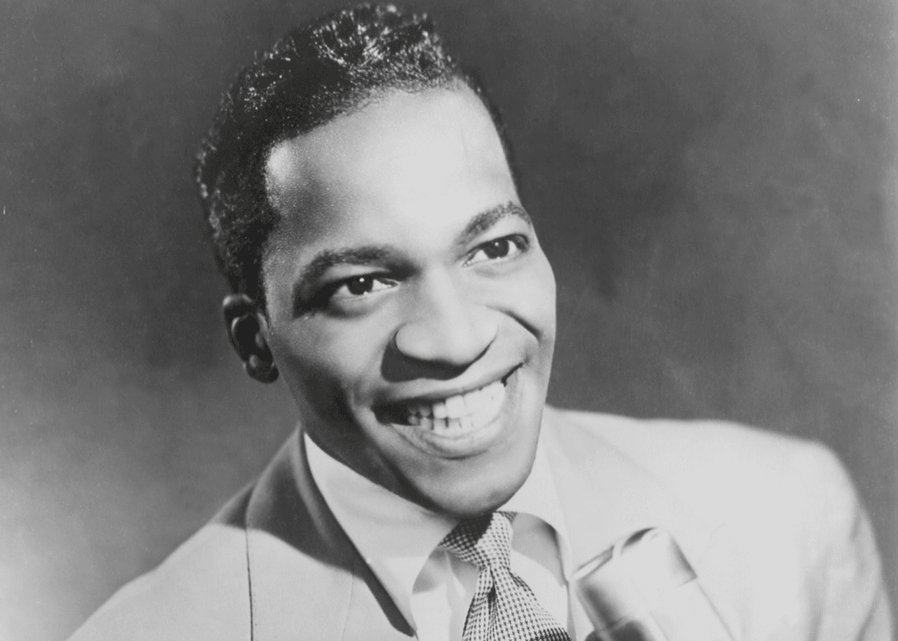Bobby Lewis posed with a microphone