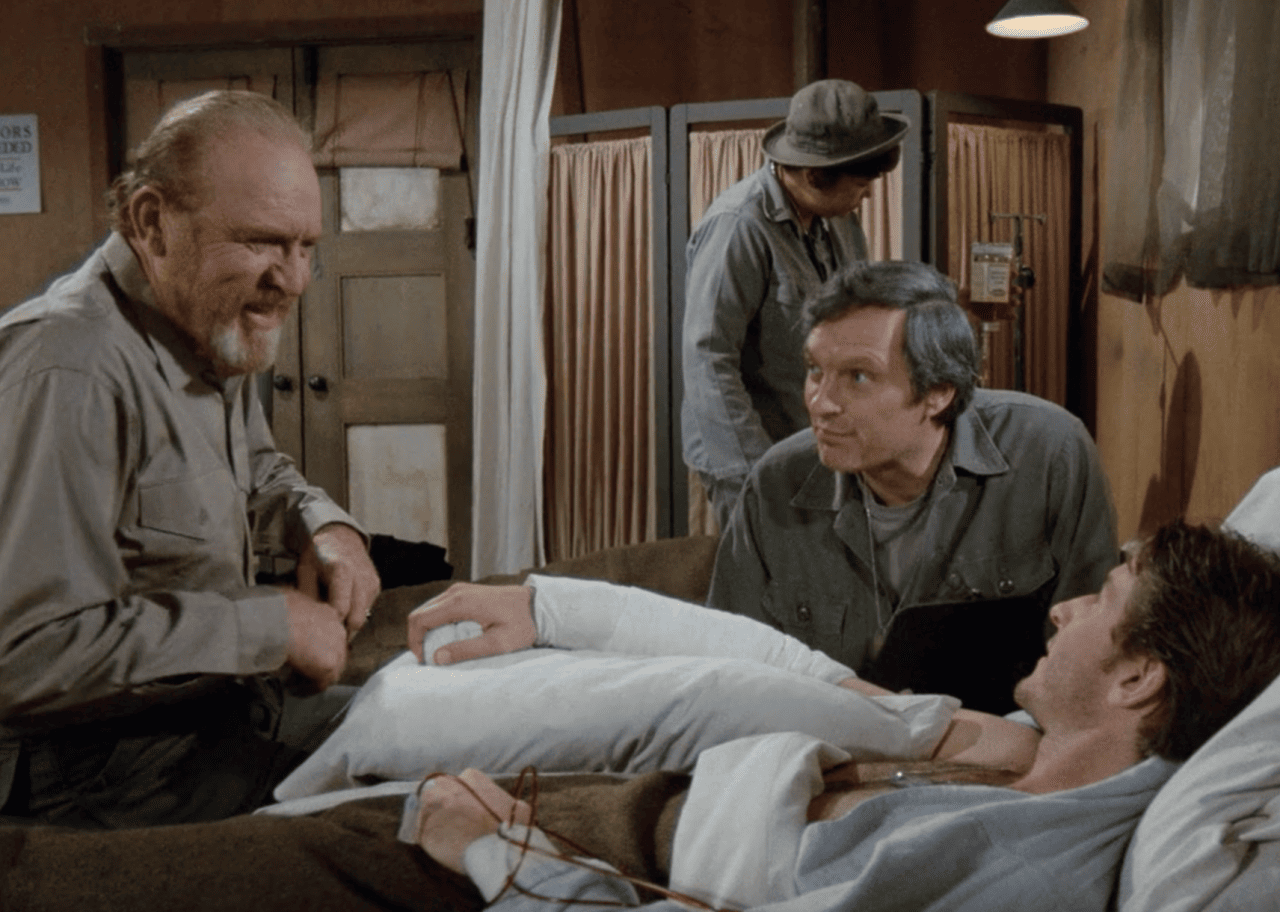 Alan Alda, Brett Cullen, and Gene Evans in 