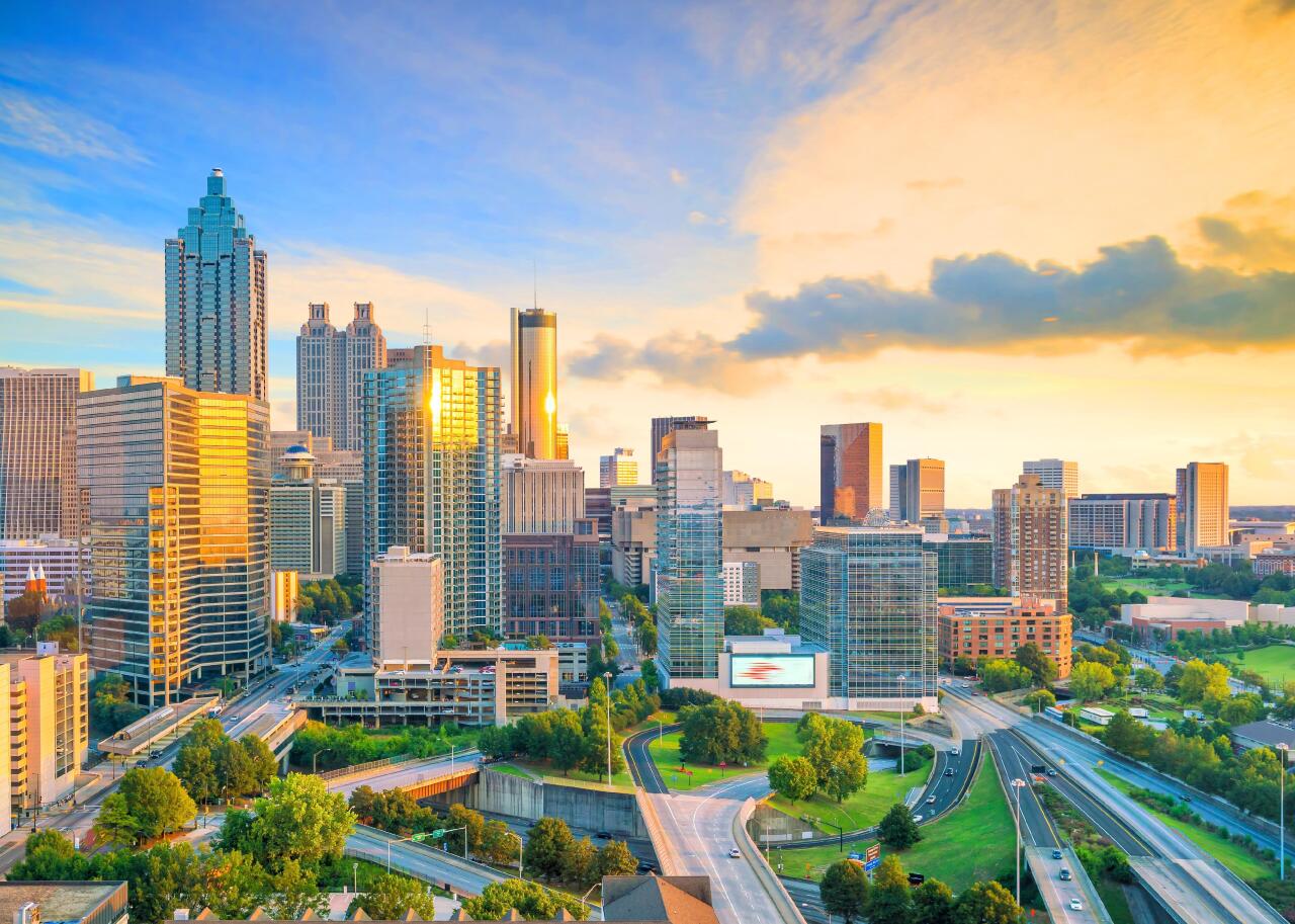 The sun's rays shine on Atlanta.